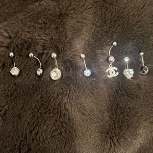 Belly button Rings 7 total.